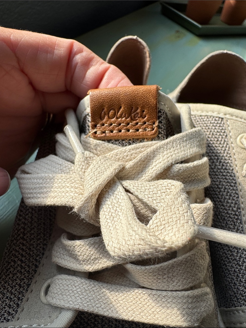 OluKai Cream Canvas Sneakers with Tan Leather Tab